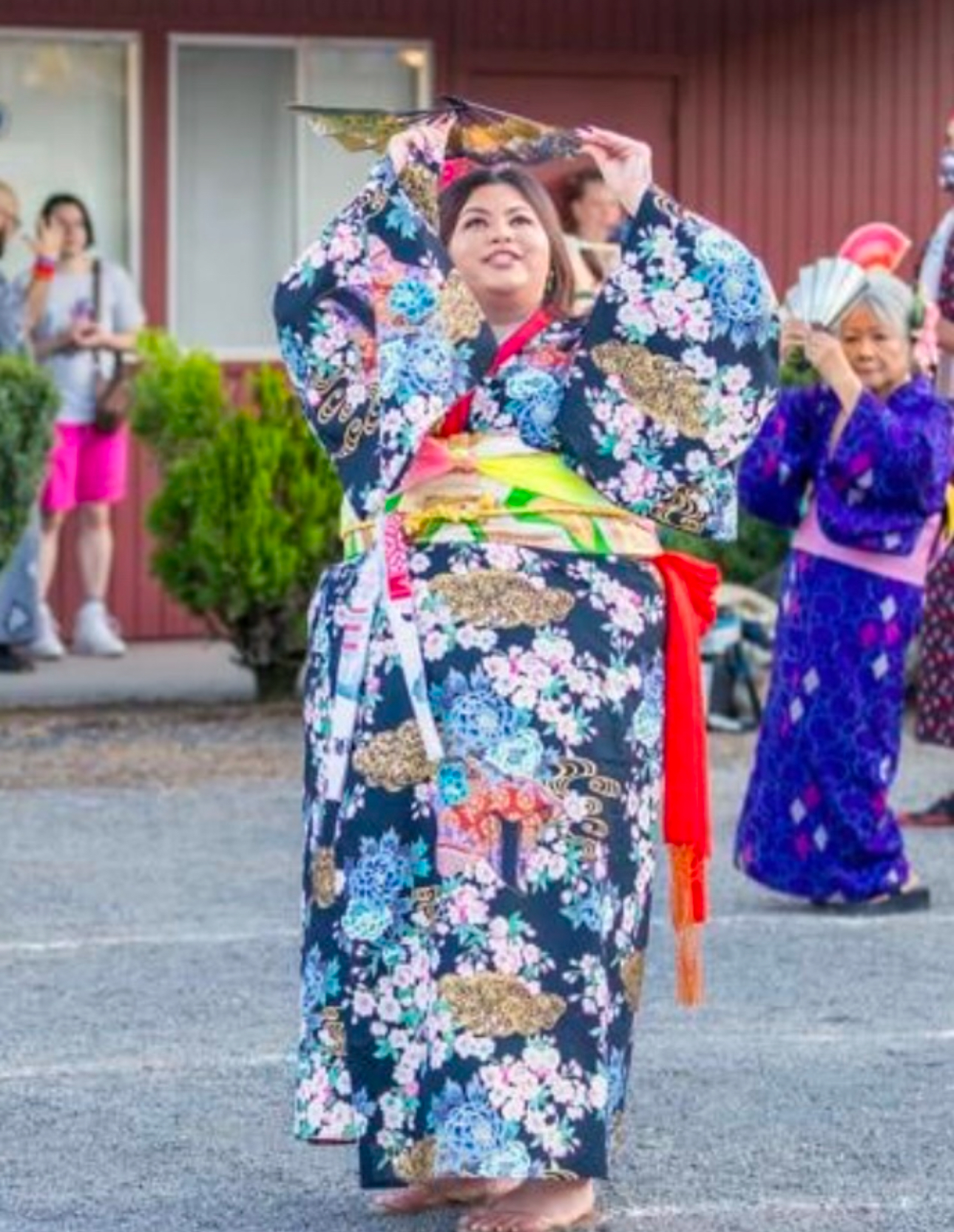 Lyndsey Burcina in a cultural attire dancing